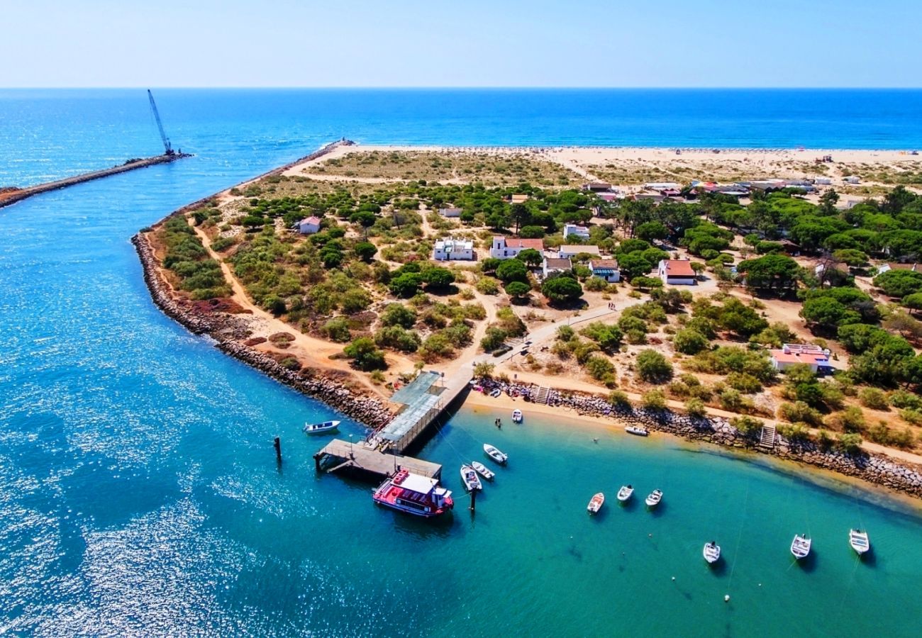 Casa adosada en Tavira - CASA CHEILE, Urbanização Marlin