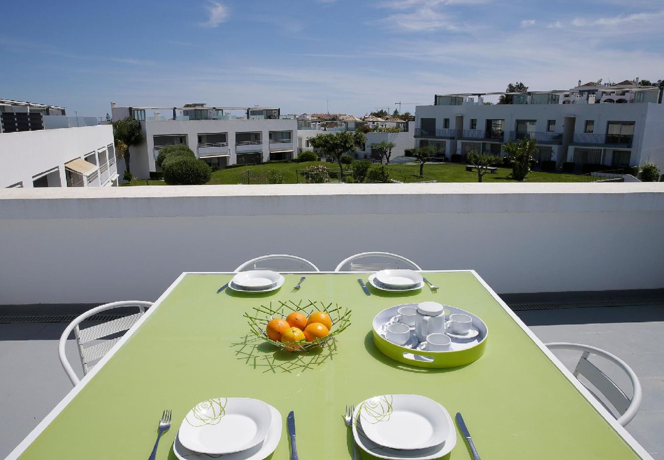 Casa adosada en Tavira - Casa María/piscina, jardín seguro y comedor en la 