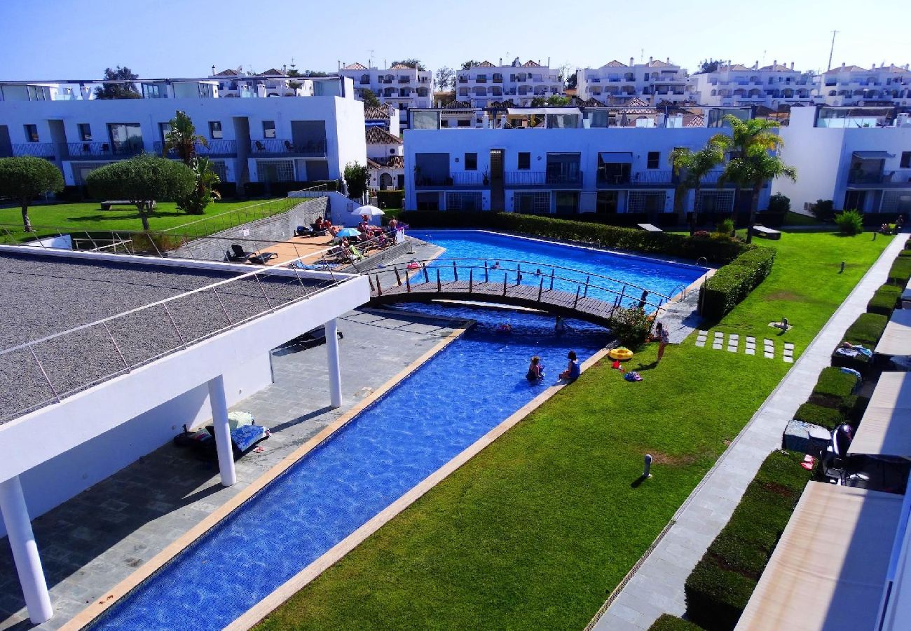 Casa adosada en Tavira - Casa María/piscina, jardín seguro y comedor en la 